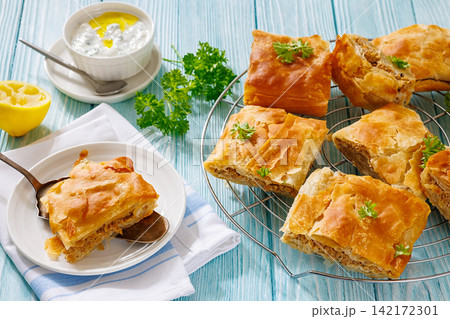 Greek kreatopita of phyllo filled with minced meat Greek kreatopita of phyllo filled with minced meat 142172301