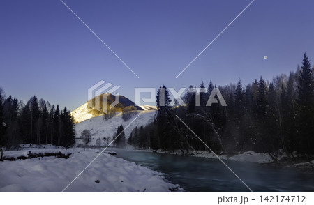 Winter River Landscape with Snowy Forest, Mountain, and Moon Winter River Landscape with Snowy Forest, Mountain, and Moon 142174712