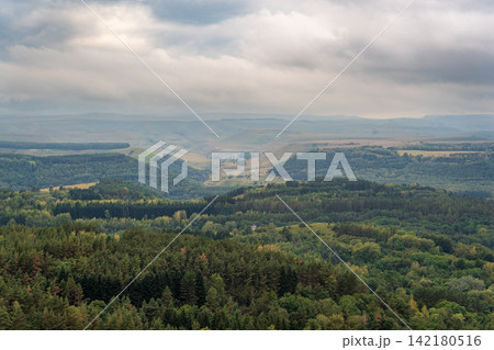 Layers of green mountains and hills in the haze during sunset. Panoramic View of Green hills and Meadow. Layers of green mountains and hills in the haze during sunset. Panoramic View of Green hills and Meadow. 142180516
