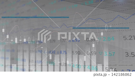 Displaying trading chart on monitor at desk, showing candle bars, volume bars, trend lines, numbers 142186862