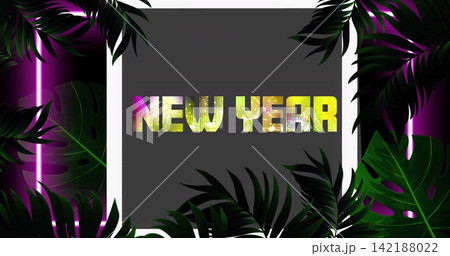 Showing centered NEW YEAR glittering neon text on dark gray panel with white frame, tropical leaves Showing centered NEW YEAR glittering neon text on dark gray panel with white frame, tropical leaves 142188022