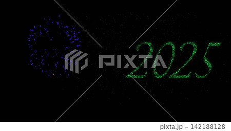 Glowing green 2025 numerals forming glittering particle trails in clear night sky, with blue burst Glowing green 2025 numerals forming glittering particle trails in clear night sky, with blue burst 142188128