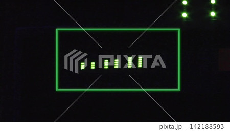 Glowing green-lit display showing vertical segmented bars on dark equipment panel with four LEDs Glowing green-lit display showing vertical segmented bars on dark equipment panel with four LEDs 142188593