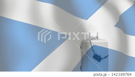 Showing silver hardshell case with handle extended straw hat shades camera on Saltire, copy space Showing silver hardshell case with handle extended straw hat shades camera on Saltire, copy space 142189764