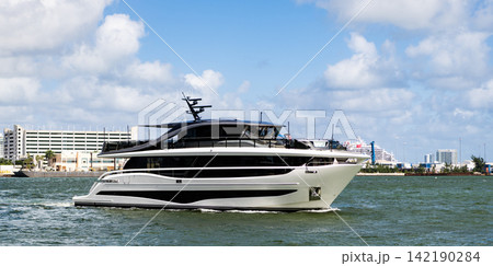 Luxury lifestyle. Vacation on summer. Yacht at sea. Motorboat yacht sailing at sea. Charter motorboat. Luxury boat motor yacht at sea. Yachting boat tourism. Motorboat in sea Luxury lifestyle. Vacation on summer. Yacht at sea. Motorboat yacht sailing at sea. Charter motorboat. Luxury boat motor yacht at sea. Yachting boat tourism. Motorboat in sea 142190284