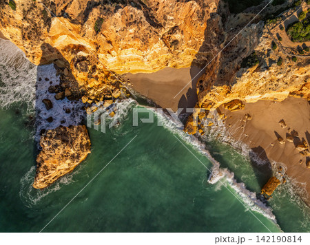 Praia da Marinha beach overhead ocean cliffs and sea stacks Algarve Portugal 142190814