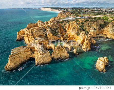 Ocean cliffs and sea stacks at Ponte da Piedade in Lagos Algarve Portugal 142190821