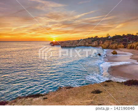 Sunset Coastline at Praia de Sao Rafael Beach in Algarve Sunset Coastline at Praia de Sao Rafael Beach in Algarve 142190840