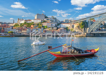 Rabelo boat on Douro River by Porto Ribeira, Portugal, wine barrel view 142191128