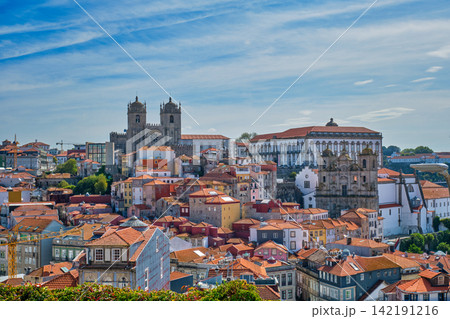 Porto Cathedral and Episcopal Palace above old city rooftops Porto Cathedral and Episcopal Palace above old city rooftops 142191216