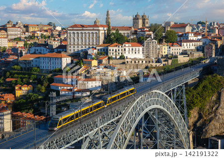 Porto sunrise tram on Luis I Bridge above Douro River from Serra do Pilar Porto sunrise tram on Luis I Bridge above Douro River from Serra do Pilar 142191322