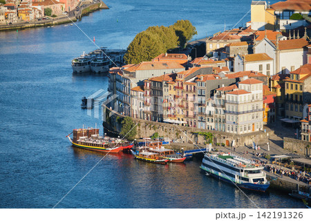 Porto Ribeira and Douro River view, Portugal, with cruise and rabelo boats Porto Ribeira and Douro River view, Portugal, with cruise and rabelo boats 142191326