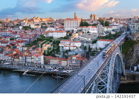 Porto sunrise tram on Luis I Bridge above Douro River in morning light Porto sunrise tram on Luis I Bridge above Douro River in morning light 142191437