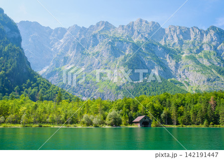 Konigsee shoreline below the Watzmann massif in Germany Konigsee shoreline below the Watzmann massif in Germany 142191447