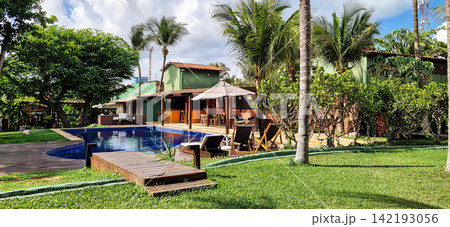 Jericoacoara, Brazil - Jan 24, 2026: Pousada resort with rustic and colorful decor in the village of Jericoacoara in Brazil Jericoacoara, Brazil - Jan 24, 2026: Pousada resort with rustic and colorful decor in the village of Jericoacoara in Brazil 142193056