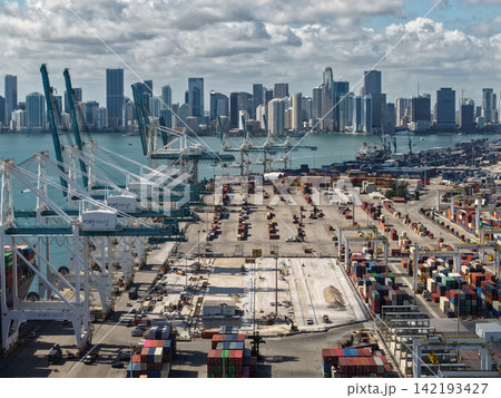 Miami, Florida - February 04, 2025: Aerial Miami port with cargo container. Maritime shipping. Port of Miami. Cargo shipping container in Miami, aerial view. Freight container, maritime warehouses Miami, Florida - February 04, 2025: Aerial Miami port with cargo container. Maritime shipping. Port of Miami. Cargo shipping container in Miami, aerial view. Freight container, maritime warehouses 142193427