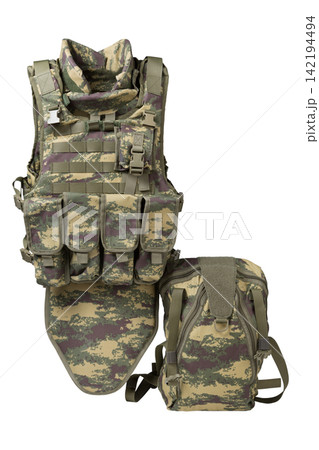 Tactical body armor vest with groin protector and backpack isolated on white background. Camouflage military plate carrier set 142194494
