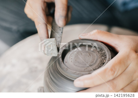 The process of creating pottery. The process of creating pottery. 142195628
