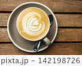 cup of cappuccino on the wooden table 142198726