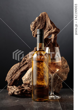 White wine with old snag and a piece of granite rock. 142199003
