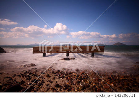 old, rusty abandoned and dismantled pier. sky space is empty. suitable for writing. old, rusty abandoned and dismantled pier. sky space is empty. suitable for writing. 142200311