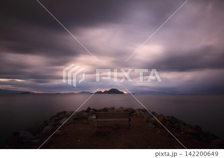 sunset on the beach. Seaside town of Turgutreis and spectacular sunsets. Selective Focus. Long Exposure shoot. tranquility scene. 142200649