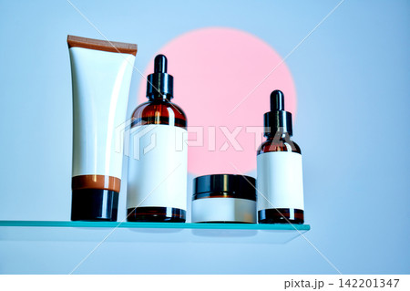 Skincare product packaging with amber glass dropper bottles Skincare product packaging with amber glass dropper bottles 142201347