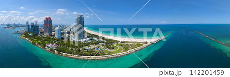 Iconic Miami coastline. Cloudy sky over Miami famous skyline. Iconic Miami coastline. Cloudy sky over Miami famous skyline. 142201459
