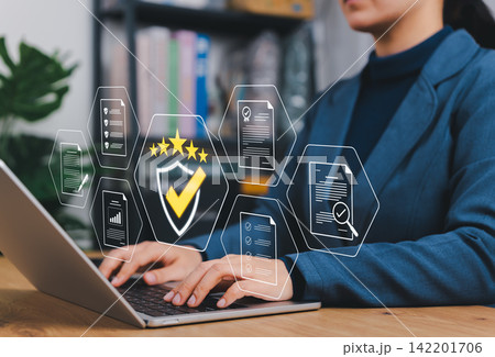 Quality Assurance and Compliance Concept. Businesswoman using laptop with icons representing quality control, document verification, audit, certificate, approval, data management, compliance assurance Quality Assurance and Compliance Concept. Businesswoman using laptop with icons representing quality control, document verification, audit, certificate, approval, data management, compliance assurance 142201706