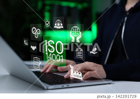 ISO 14001 environmental management system compliance concept. Person using laptop with sustainability, audit, certification, checklist icons, EMS standards, green governance, corporate responsibility 142201729