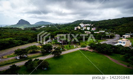 Lush Mountain Village Landscape Under Dramatic Clouds in Kenting Taiwan Lush Mountain Village Landscape Under Dramatic Clouds in Kenting Taiwan 142201848