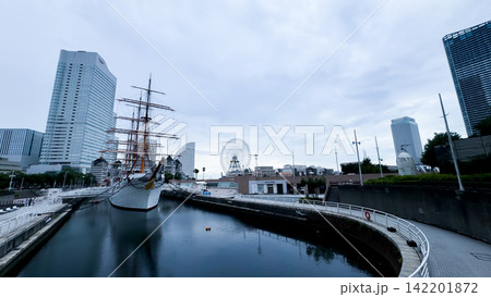 Historic Sailing Ship Nippon Maru and Ferris Wheel in Yokohama Minato Mirai Historic Sailing Ship Nippon Maru and Ferris Wheel in Yokohama Minato Mirai 142201872