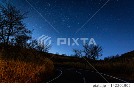Winding Mountain Road Under a Brilliant Starry Sky in Japan 142201903