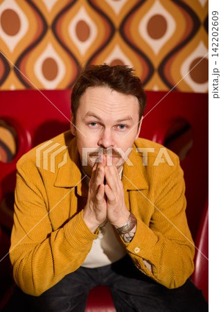 Professional business portrait. Businessman in stylish booth Professional business portrait. Businessman in stylish booth 142202609