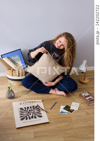 Female enjoying true happiness among artistic and natural light 142202722
