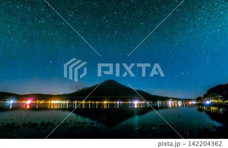 Star Filled Milky Way Sky Above Mount Fuji and Lake Reflections Star Filled Milky Way Sky Above Mount Fuji and Lake Reflections 142204362