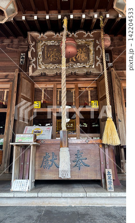 Historic Japanese Shrine Building in a Cherry Blossom Park Historic Japanese Shrine Building in a Cherry Blossom Park 142204533