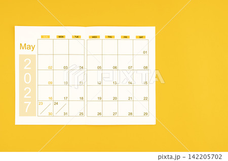 Agenda or planner book for May 2027 calendar with blank space for your text. 142205702