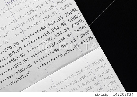 Bank account book statement balance number cash, hand holding data investment debt math in office, bill receipt and payment business credit card account, check paper financial loan tax concept. Bank account book statement balance number cash, hand holding data investment debt math in office, bill receipt and payment business credit card account, check paper financial loan tax concept. 142205834