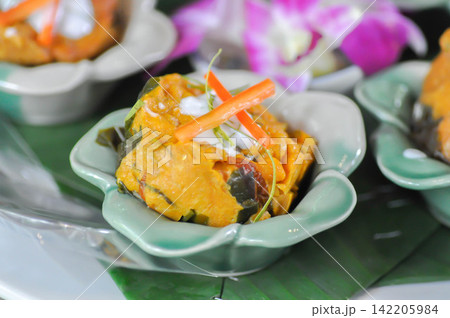 steamed fish, steamed fish in curry mousse or Hor Mok , Thai steamed fish curry or Steamed curried fish custards 142205984