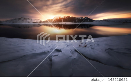 Winter Mountain Lake Panorama at Dramatic Sunset 142210621
