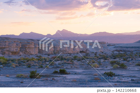 Desert Mountain Landscape at Pastel Sunset Desert Mountain Landscape at Pastel Sunset 142210668