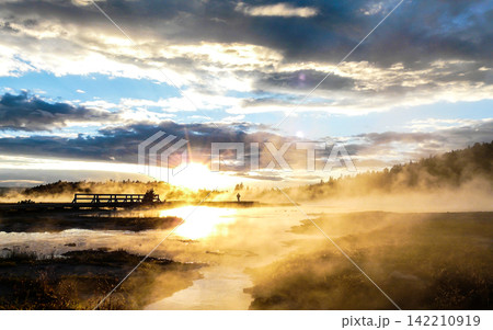 Misty Hot Spring Sunrise Landscape with Dramatic Clouds Misty Hot Spring Sunrise Landscape with Dramatic Clouds 142210919