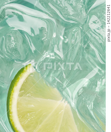 Sparkling transparent ice fresh lime summer background Sparkling transparent ice fresh lime summer background 142212641