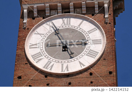 Clock on Torre dei Lamberti - medieval tower of the Lamberti XI century - 84 m. Piazza delle Erbe, UNESCO world heritage site in Verona, Italy Clock on Torre dei Lamberti - medieval tower of the Lamberti XI century - 84 m. Piazza delle Erbe, UNESCO world heritage site in Verona, Italy 142214152