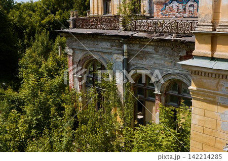 Decorative veranda showcasing rustic stone arches and graffiti Decorative veranda showcasing rustic stone arches and graffiti 142214285
