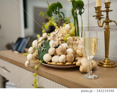 Intimate tablescape with candles, champagne and moss centerpiece Intimate tablescape with candles, champagne and moss centerpiece 142214348