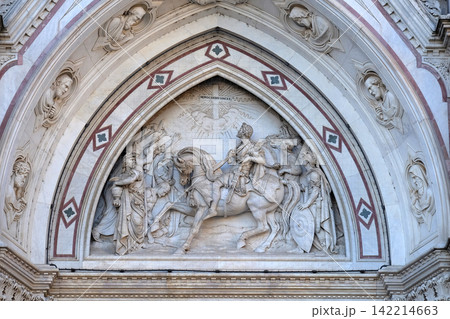 Sculpted lunette containing a scene depicting the Vision of Constantine, by Emilio Zocchi, over the right door of Basilica of Santa Croce (Basilica of the Holy Cross) - famous Franciscan church in Sculpted lunette containing a scene depicting the Vision of Constantine, by Emilio Zocchi, over the right door of Basilica of Santa Croce (Basilica of the Holy Cross) - famous Franciscan church in 142214663