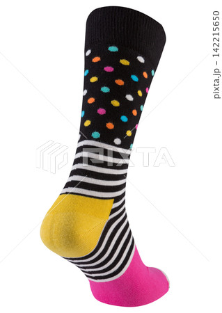 Patterned sock with polka dots and stripes on ghost mannequin isolated on white background. Colorful casual mens sock back view Patterned sock with polka dots and stripes on ghost mannequin isolated on white background. Colorful casual mens sock back view 142215650