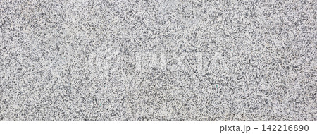 Granite stone surface texture showing speckled pattern 142216890
